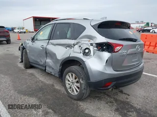 2014 Mazda CX-5 Touring with VIN JM3KE4CY1E0426409, listed as a IAAI auction lot 41924258 with 116,956 mi miles. Bid and sale history available at carsss.com. Image 3.
