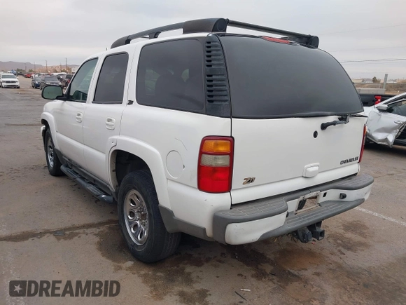 2002 Chevrolet Tahoe Z71 with VIN 1GNEK13Z22R303223, listed as a IAAI auction lot 41527148 with 211,835 mi miles. Bid and sale history available at carsss.com. Image 3.