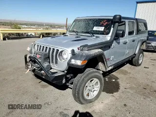 2023 Jeep Gladiator Rubicon FarOut z VIN 1C6JJTBM2PL587711, wystawiony jako Copart lot #77280214 z przebiegiem Nie podano mil oraz Szkoda całkowita • Salvage title. Historia ofert i sprzedaży dostępna na DreamBid. Obrazek 14.