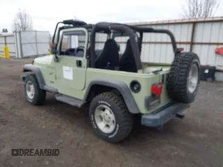 2001 Jeep Wrangler Sport with VIN 1J4FA49S91P354668, listed as a IAAI auction lot 41883227 with 197,043 mi miles and . Bid and sale history available at carsss.com. Image 3.