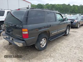 2004 Chevrolet Tahoe LT with VIN 1GNEC13Z14R203713, listed as a IAAI auction lot 42490743 with 216,529 mi miles and . Bid and sale history available at DreamBid. Image 4.