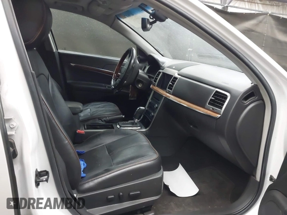 2012 Lincoln MKZ Hybrid with VIN 3LNDL2L39CR819759, listed as a IAAI auction lot 41968714 with 290,777 mi miles and . Bid and sale history available at DreamBid. Image 5.