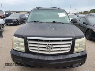 2003 Cadillac Escalade z VIN 1GYEC63T43R206146, wystawiony jako IAAI lot #41335727 z przebiegiem Nie podano mil oraz . Historia ofert i sprzedaży dostępna na DreamBid. Obrazek 6.