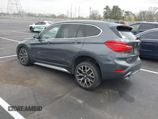 2021 BMW X1 sDrive28i with VIN WBXJG7C07M5S08831, listed as a IAAI auction lot 41829653 with 51,052 mi miles. Bid and sale history available at carsss.com. Image 3.