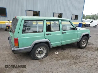 1999 Jeep Cherokee SE with VIN 1J4FF28SXXL641556, listed as a Copart auction lot 62605065 with Not provided miles and Salvage title. Bid and sale history available at DreamBid. Image 3.