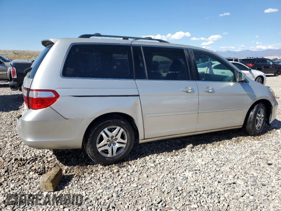2007 Honda Odyssey EX-L z VIN 5FNRL38647B028078, wystawiony jako Copart lot #56208005 z przebiegiem 192 000 mil mil oraz Szkoda całkowita • Salvage title. Historia ofert i sprzedaży dostępna na DreamBid. Obrazek 3.