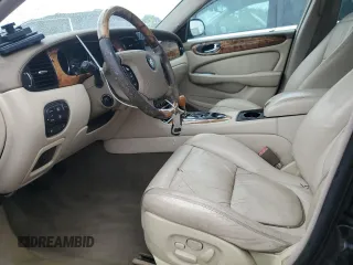 2004 Jaguar XJ VDP with VIN SAJWA74C64SG27143, listed as a Copart auction lot 71373744 with 129,942 mi miles and Salvage Title. Bid and sale history available at carsss.com. Image 7.