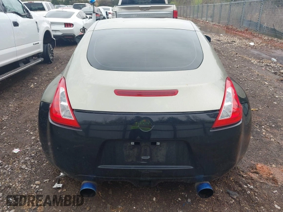 2009 Nissan 370Z Touring with VIN JN1AZ44E69M404341, listed as a IAAI auction lot 41907551 with 144,612 mi miles and . Bid and sale history available at DreamBid. Image 16.