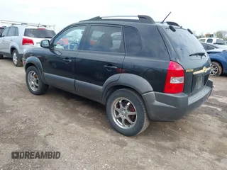 2005 Hyundai Tucson GLS with VIN KM8JN12D55U053476, listed as a IAAI auction lot 42118213 with 202,475 mi miles. Bid and sale history available at carsss.com. Image 3.