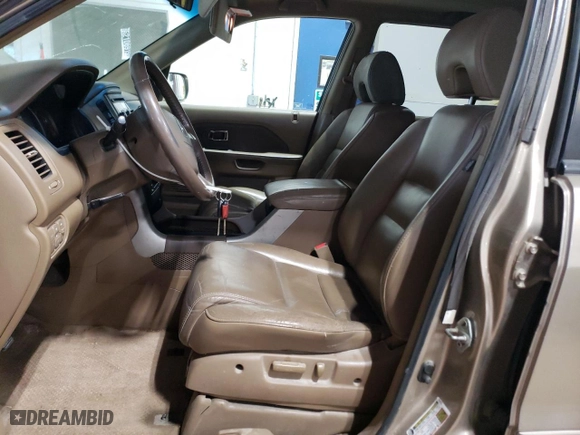 2006 Honda Pilot EX-L with VIN 5FNYF18516B004298, listed as a Copart auction lot 52034645 with 276,019 mi miles and Salvage Title. Bid and sale history available at carsss.com. Image 7.
