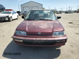 1990 Honda Civic z VIN 1HGED365XLL021473, wystawiony jako Copart lot #54102815 z przebiegiem 205 883 mil mil oraz Czysty tytuł • Clean title. Historia ofert i sprzedaży dostępna na DreamBid. Obrazek 5.