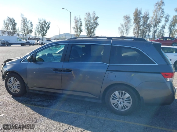 2014 Honda Odyssey LX with VIN 5FNRL5H23EB015067, listed as a IAAI auction lot 41760301 with 167,389 mi miles. Bid and sale history available at carsss.com. Image 14.
