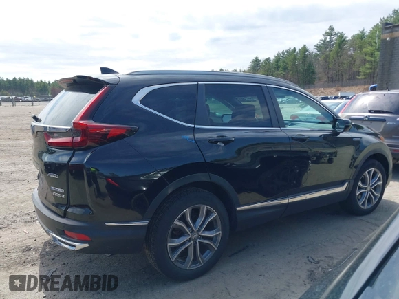 2020 Honda CR-V Touring with VIN 7FART6H96LE023782, listed as a IAAI auction lot 42053948 with 56,814 mi miles and . Bid and sale history available at DreamBid. Image 13.