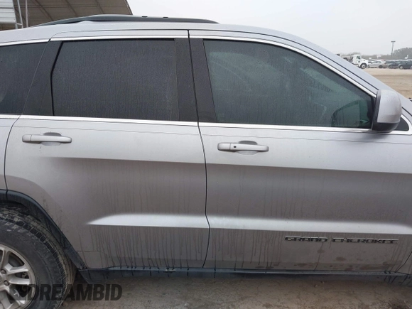 2018 Jeep Grand Cherokee Laredo E with VIN 1C4RJEAG8JC382825, listed as a IAAI auction lot 41288056 with 105,652 mi miles. Bid and sale history available at carsss.com. Image 13.