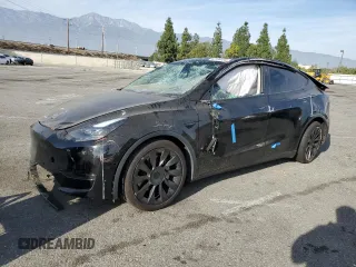 2021 Tesla Model Y Standard Range with VIN 5YJYGDED2MF124330, listed as a Copart auction lot 83185034 with Not Provided miles and Salvage Title. Bid and sale history available at carsss.com. Image 1.