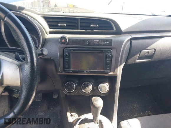 2015 Scion tC with VIN JTKJF5C77F3088828, listed as a IAAI auction lot 41846399 with 203,677 mi miles. Bid and sale history available at carsss.com. Image 18.