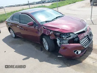 2013 Toyota Avalon XLE with VIN 4T1BK1EB5DU067688, listed as a IAAI auction lot 42568172 with 120,001 mi miles and . Bid and sale history available at DreamBid. Image 1.