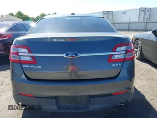 2015 Ford Taurus SEL z VIN 1FAHP2E83FG184588, wystawiony jako IAAI lot #42262166 z przebiegiem 116 392 mil mil oraz . Historia ofert i sprzedaży dostępna na DreamBid. Obrazek 16.