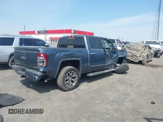 2014 GMC Sierra 1500 SLT with VIN 3GTU2VEC9EG188869, listed as a IAAI auction lot 41876520 with 147,367 mi miles and . Bid and sale history available at DreamBid. Image 4.
