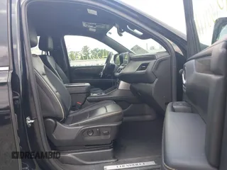 2023 Chevrolet Suburban Premier with VIN 1GNSKFKDXPR385697, listed as a IAAI auction lot 42601771 with 75,487 mi miles and . Bid and sale history available at DreamBid. Image 5.