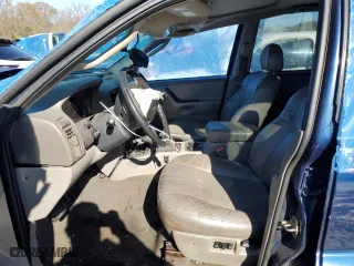 2002 Jeep Grand Cherokee Laredo with VIN 1J4GW48N02C165868, listed as a Copart auction lot 82228494 with 0 mi miles and Salvage Title. Bid and sale history available at carsss.com. Image 7.