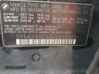 2012 BMW X5 M with VIN 5YMGY0C53CLK27448, listed as a Copart auction lot 80757454 with 146,435 mi miles and Salvage Title. Bid and sale history available at carsss.com. Image 13.