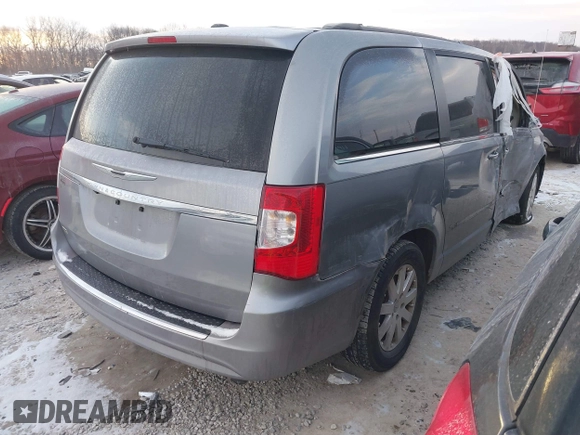 2014 Chrysler Town & Country Touring z VIN 2C4RC1BG2ER131605, wystawiony jako IAAI lot #41406423 z przebiegiem 167 567 mil mil oraz . Historia ofert i sprzedaży dostępna na DreamBid. Obrazek 4.