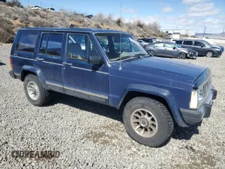 1987 Jeep Cherokee with VIN 1JCMT7842HT114597, listed as a Copart auction lot 49319945 with 230,675 mi miles and Clean title. Bid and sale history available at DreamBid. Image 4.