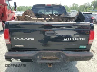 2003 Dodge Dakota z VIN 1D7HG38Z13S220152, wystawiony jako Copart lot #54314515 z przebiegiem Nie podano mil oraz Szkody całkowita. Historia ofert i sprzedaży dostępna na DreamBid. Obrazek 6.
