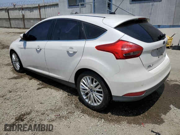 2015 Ford Focus Titanium with VIN 1FADP3N23FL375368, listed as a Copart auction lot 60707305 with 153,300 mi miles and Clean title. Bid and sale history available at DreamBid. Image 2.