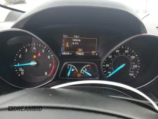 2018 Ford Escape SE z VIN 1FMCU9GD4JUA49819, wystawiony jako Copart lot #73023734 z przebiegiem 96 228 mil mil oraz Szkody całkowita. Historia ofert i sprzedaży dostępna na DreamBid. Obrazek 9.