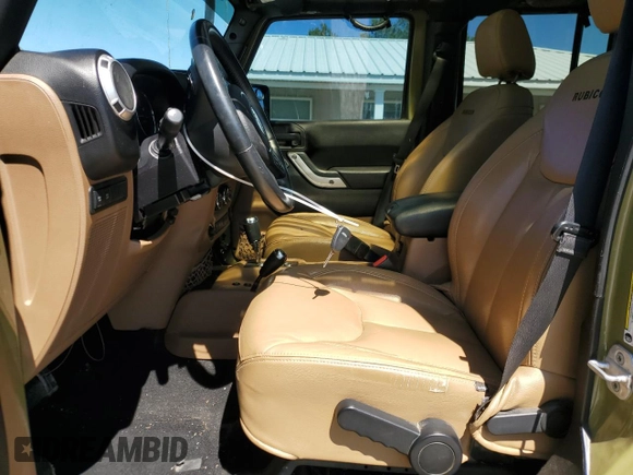 2013 Jeep Wrangler Unlimited Rubicon with VIN 1C4BJWFG0DL587057, listed as a Copart auction lot 57362535 with 102,684 mi miles and Salvage title. Bid and sale history available at DreamBid. Image 7.