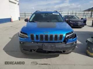2019 Jeep Cherokee Trailhawk z VIN 1C4PJMBX5KD122328, wystawiony jako Copart lot #54066865 z przebiegiem 59 924 mil mil oraz Szkoda całkowita • Salvage title. Historia ofert i sprzedaży dostępna na DreamBid. Obrazek 5.