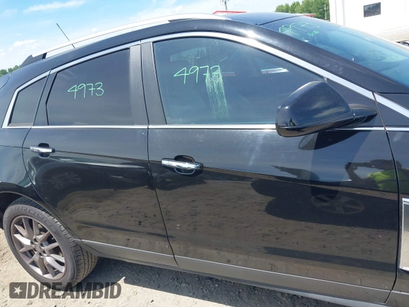 2015 Cadillac SRX Performance Collection with VIN 3GYFNCE30FS549872, listed as a IAAI auction lot 42201529 with 125,128 mi miles and . Bid and sale history available at DreamBid. Image 14.