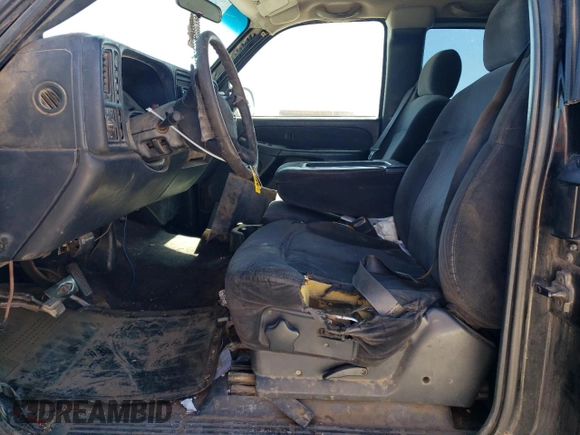 2001 Chevrolet Silverado 1500 LS with VIN 2GCEK19T311166246, listed as a Copart auction lot 46869555 with 327,121 mi miles and Salvage Title. Bid and sale history available at DreamBid. Image 7.