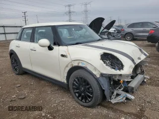 2018 MINI Hardtop 4 Door Cooper with VIN WMWXU1C56J2F80957, listed as a Copart auction lot 53713785 with 73,030 mi miles and Salvage Title. Bid and sale history available at DreamBid. Image 4.