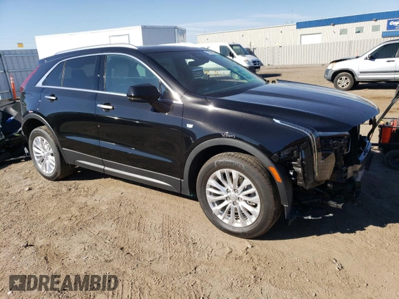 2024 Cadillac XT4 AWD Luxury with VIN 1GYFZBR41RF114434, listed as a Copart auction lot 73217514 with 10,505 mi miles and Salvage Title. Bid and sale history available at carsss.com. Image 4.