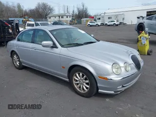 2001 Jaguar S-Type with VIN SAJDA01PX1GM01530, listed as a IAAI auction lot 41930674 with 124,963 mi miles and . Bid and sale history available at DreamBid. Image 1.