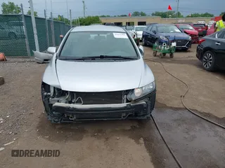 2009 Honda Civic LX z VIN 19XFA16529E038947, wystawiony jako IAAI lot #42412486 z przebiegiem 161 409 mil mil oraz . Historia ofert i sprzedaży dostępna na DreamBid. Obrazek 13.