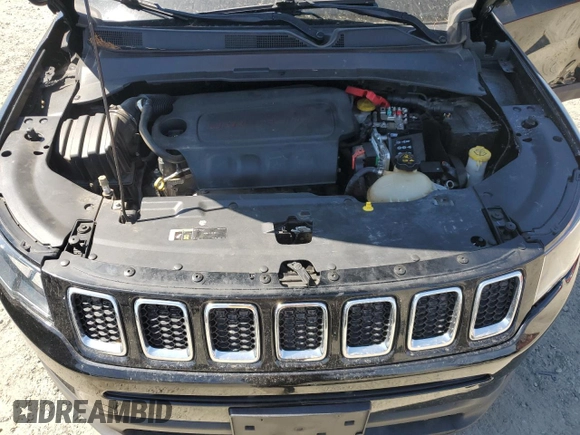 2021 Jeep Compass Sport с VIN 3C4NJCAB8MT545909, выставлен на аукционе Copart как лот 59778355 с пробегом 71 029 миль миль и Списание • Salvage title. История ставок и продаж доступна на DreamBid. Изображение 12.