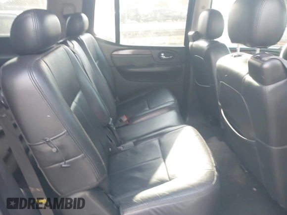 2005 GMC Envoy SLT z VIN 1GKET16M956158147, wystawiony jako IAAI lot #41683236 z przebiegiem Nie podano mil oraz . Historia ofert i sprzedaży dostępna na DreamBid. Obrazek 8.