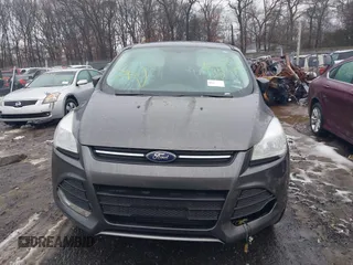 2016 Ford Escape SE z VIN 1FMCU9G97GUC12743, wystawiony jako IAAI lot #41529265 z przebiegiem Nie podano mil oraz . Historia ofert i sprzedaży dostępna na DreamBid. Obrazek 6.
