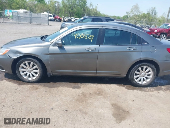 2012 Chrysler 200 Touring with VIN 1C3CCBBGXCN326023, listed as a IAAI auction lot 42126529 with 163,325 mi miles and . Bid and sale history available at carsss.com. Image 14.