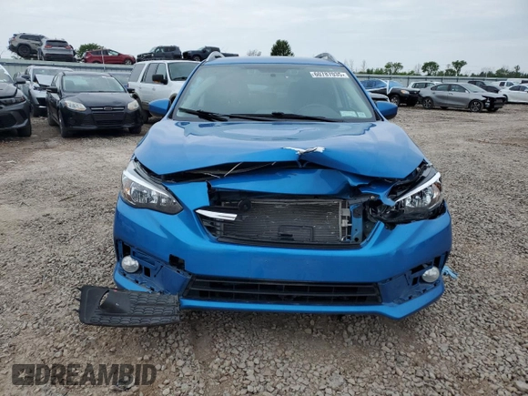 2022 Subaru Impreza Premium with VIN 4S3GTAV60N3711910, listed as a Copart auction lot 60787035 with 58,828 mi miles and Salvage title. Bid and sale history available at DreamBid. Image 5.