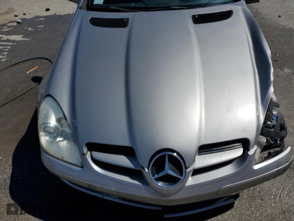 2006 Mercedes-Benz SLK 280 z VIN WDBWK54F36F120802, wystawiony jako Copart lot #49447415 z przebiegiem 133 291 mil mil oraz Szkody całkowita. Historia ofert i sprzedaży dostępna na DreamBid. Obrazek 11.