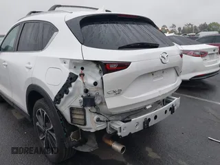 2022 Mazda CX-5 S Premium Plus with VIN JM3KFBEM6N0615083, listed as a IAAI auction lot 41907406 with 49,617 mi miles and . Bid and sale history available at carsss.com. Image 6.