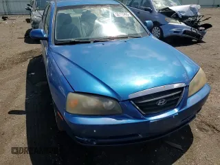2005 Hyundai Elantra GLS z VIN KMHDN46D15U063723, wystawiony jako Copart lot #56113495 z przebiegiem 115 513 mil mil oraz Szkoda całkowita • Salvage title. Historia ofert i sprzedaży dostępna na DreamBid. Obrazek 13.