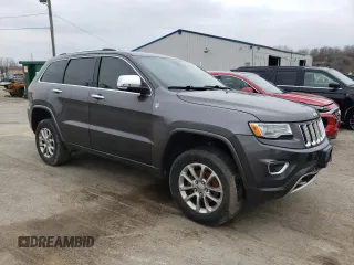2014 Jeep Grand Cherokee Overland with VIN 1C4RJFCG8EC155109, listed as a Copart auction lot 52992825 with 128,604 mi miles and Clean Title. Bid and sale history available at carsss.com. Image 4.