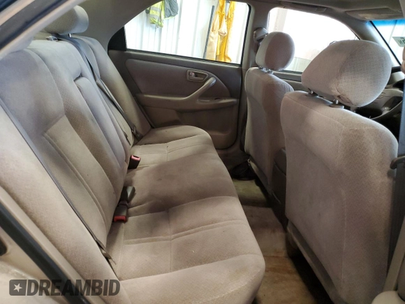 2000 Toyota Camry CE z VIN 4T1BG22K2YU742415, wystawiony jako Copart lot #55763165 z przebiegiem 245 821 mil mil oraz Czysty tytuł • Clean title. Historia ofert i sprzedaży dostępna na DreamBid. Obrazek 10.