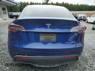 2024 Tesla Model Y Long Range with VIN 7SAYGDEE2RA246685, listed as a Copart auction lot 58699895 with 15,803 mi miles and Salvage title. Bid and sale history available at DreamBid. Image 6.